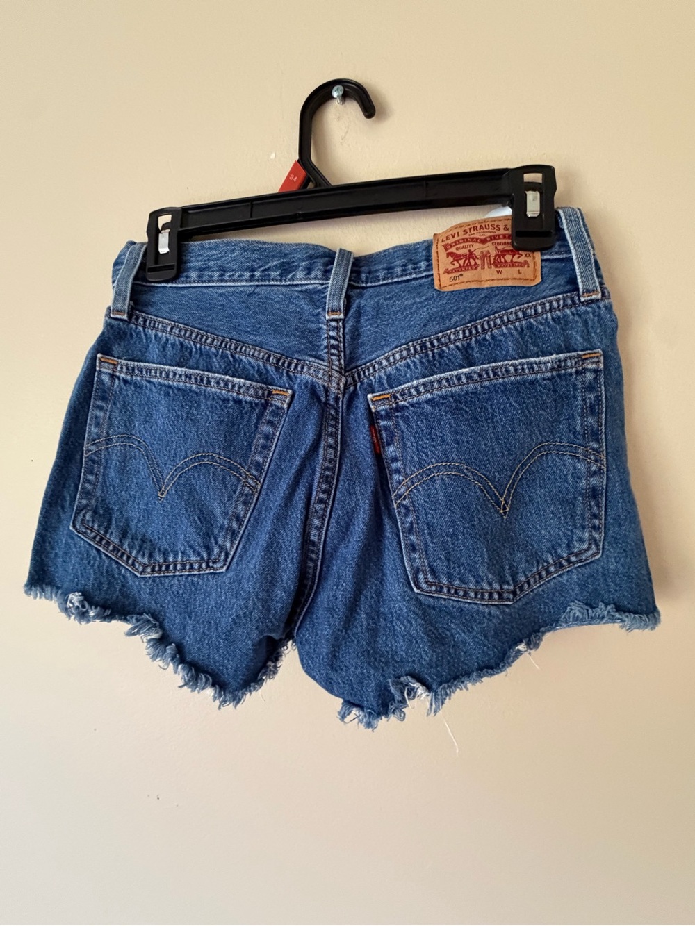 Levi's Distressed Mid-Blue Denim Cutoff Shorts